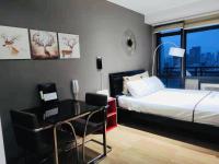 Deluxe Studio met Queensize Bed 