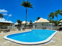 Superbe Duplex vue piscine résidence citerne - Chambres d’hôtes Saint-François