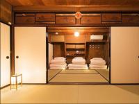 Camera Familiare con Bagno in Comune
