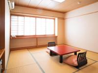 Quadruple Room with Shared Bathroom