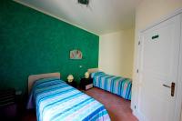 Camera Doppia con Letti Singoli