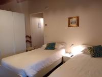 Camera Doppia con Letti Singoli