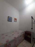 Single Bed in Dormitory Room