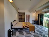 Chambre Lit King-Size avec Balcon
