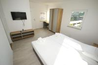 Camera Matrimoniale/Doppia con Letti Singoli con Letto Supplementare