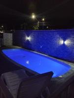 Kitnet com piscina em cond fechado a 200 m da praia com wi-fi - B&B Caraguatatuba