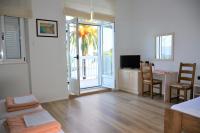 Driepersoonskamer met Balkon en Uitzicht op Zee