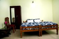Chambre Double Deluxe (2 Adultes + 1 Enfant)
