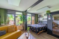 Habitación Triple con vistas al jardín
