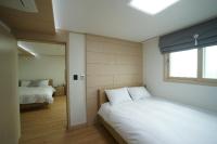 Улучшенный двухместный номер с 2 отдельными кроватями и видом на море