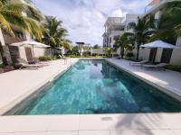 Beachwalk Deluxe Apartment - 50 steps to the beach - B&B Cap Malheureux