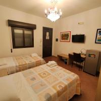 Chambre Lits Jumeaux avec Salle de Bains Privative