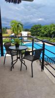 Apartamento de verano cerca al parque del café - Chambres d’hôtes