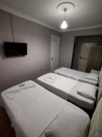 Deluxe Dreibettzimmer