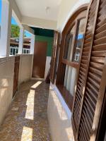 Casa aconchegante à 400m da Praia da Tartaruga - Ar condicionado - WIFI 450MB - Netflix - Cozinha Completa - Garagem - Chambres d'hôtes Rio das Ostras