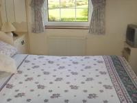 Camera Matrimoniale con Servizi Igienici in Comune