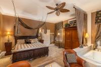 Zimmer mit Kingsize-Bett und Whirlpool