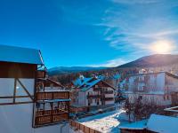Dreibettzimmer mit Bergblick
