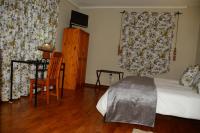 Doppel-/Zweibettzimmer mit Gartenblick