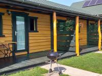 Comfortable holiday homes, garden, playground - B&B Sarbinowo