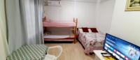 KITNET S2 em TORRES-RS - Na mais bela praia Gaúcha - Cozinha - Banheiro - Ar condicionado - TV smart 32' - Wi-Fi - Estacionamento - Anfitriã Superhost no BnB - Ferienwohnung
