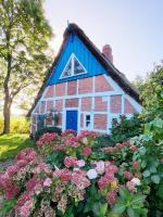 B&B Krummendeich - Die blaue Reetdachkate am Deich - Bed and Breakfast Krummendeich