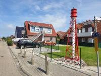 Ferienwohnung Leuchtturm am Sandstrand - Ferienwohnung Norden