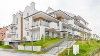 Apartamenty Sun & Snow Baltic Sun z basenem i placem zabaw - B&B