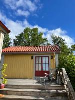 Gästhus med utsikt över Drottningholms slott - Ferienwohnung Drottningholm