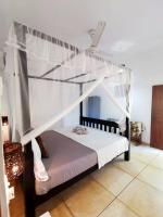 Habitación Deluxe con cama extragrande, balcón y aire acondicionado 