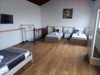 Chambre Quadruple avec Salle de Bains Commune