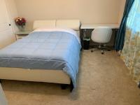 Queen Room with Shared Bathroom