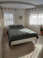 Chaleureux Appartement à 1 min à pied de la Mosquée Hassan II - B&B Casablanca