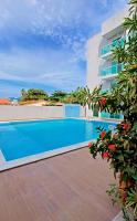 Apartamento de dois quartos, no Peroba Ville Residence - próximo à praia, em Peroba-AL - Ferienwohnung Maragogi