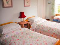 Deluxe Doppel-/Zweibettzimmer mit Gartenblick