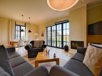 Reetland am Meer - Luxus Reetdachvilla mit 3 Schlafzimmern, Sauna und Kamin F08 - B&B Dranske
