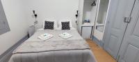 Camera Tripla Economy con Bagno in Comune