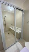 Two Bedroom with Balcony by The Bali Corner at Azure North , POOL and BEACH VIEW - unit with Bathtub - B&B San Fernando City