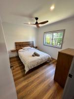 Luxury Holiday Unit 8min walk to Town Center with Boat Parking - Chambres d’hôtes Mallacoota