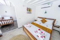Chambre Familiale - Vue Latérale sur Mer