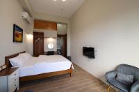 Deluxe tweepersoonskamer met balkon en uitzicht op zee