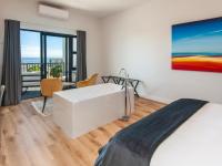 Suite mit Kingsize-Bett und Meerblick