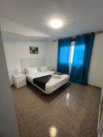 2C - Appartamento con 2 Camere da Letto, Balcone e Vista Città