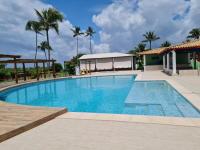 Casa 4 quartos, com piscina no Condominio Sol Marina Jacuipe com acesso a praia e ao rio de Jacuipe - Ferienwohnung