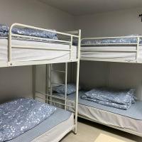 Camera Familiare con Bagno in Comune