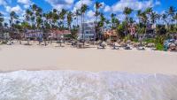 Dream Punta Cana Beachfront Apartment - 4-Bedroom Penthouse with Rooftop BBQ & Ocean Views - Chambres d'hôtes Punta Cana