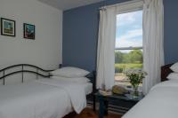 Deluxe Zimmer mit Queensize-Bett und Einzelbett
