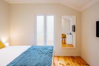 Camera Matrimoniale con Terrazza e Bagno in Comune