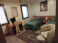 Tweepersoonskamer met 2 Aparte Bedden