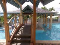 Appartement KER-EOL Résidence CANOUAN Sainte-Anne avec piscine - B&B Sainte-Anne